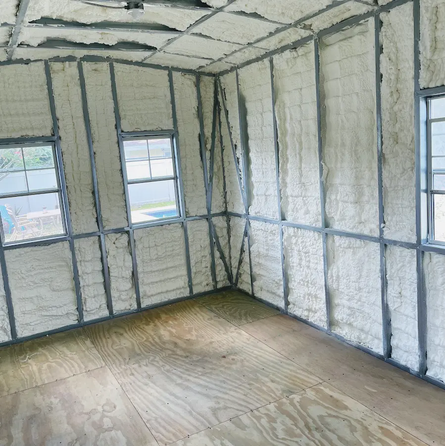Closed-cell spray foam insulation applied to wall cavities in a residential project in Lake City